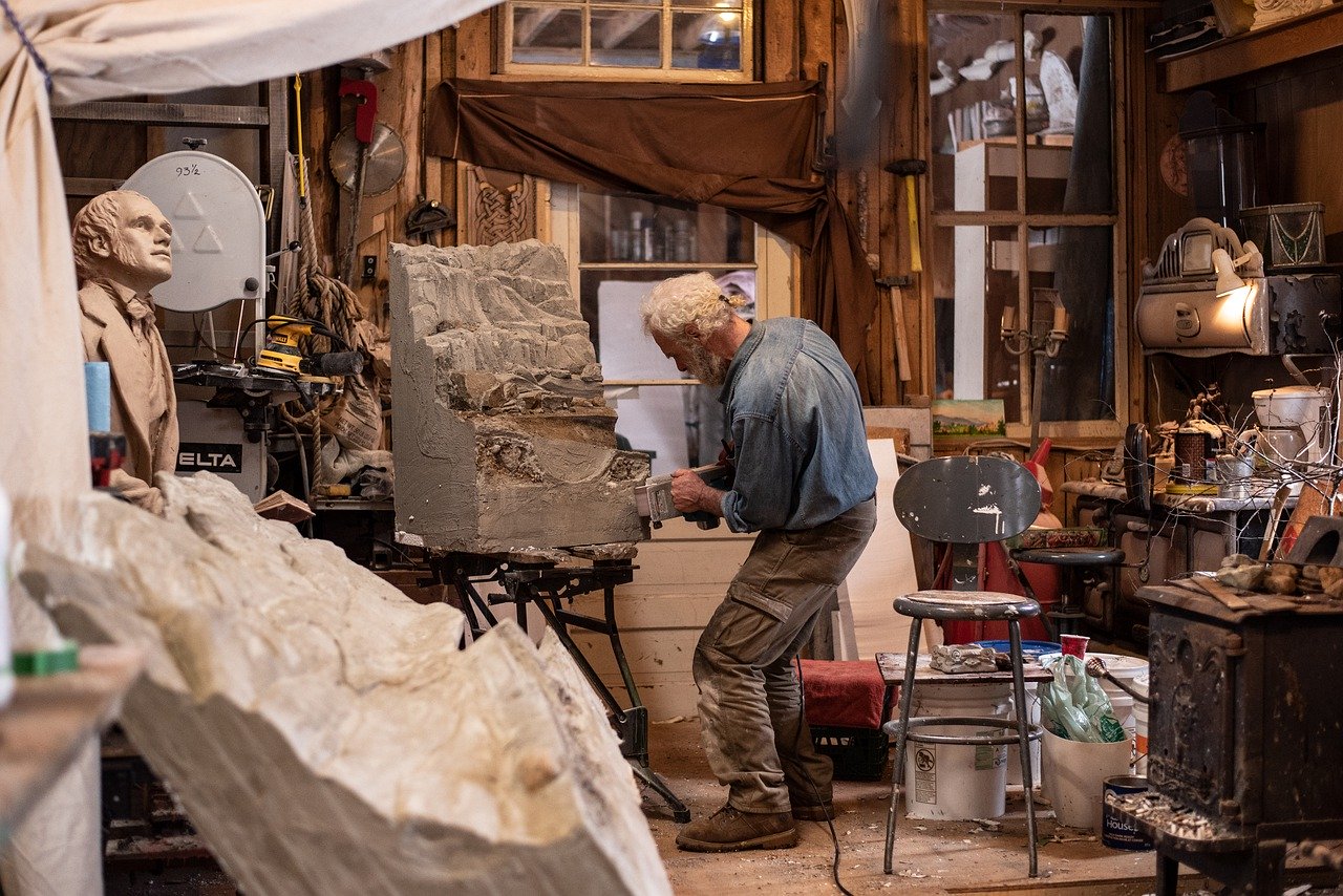 sculptor in art workshop