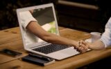 handshake from laptop