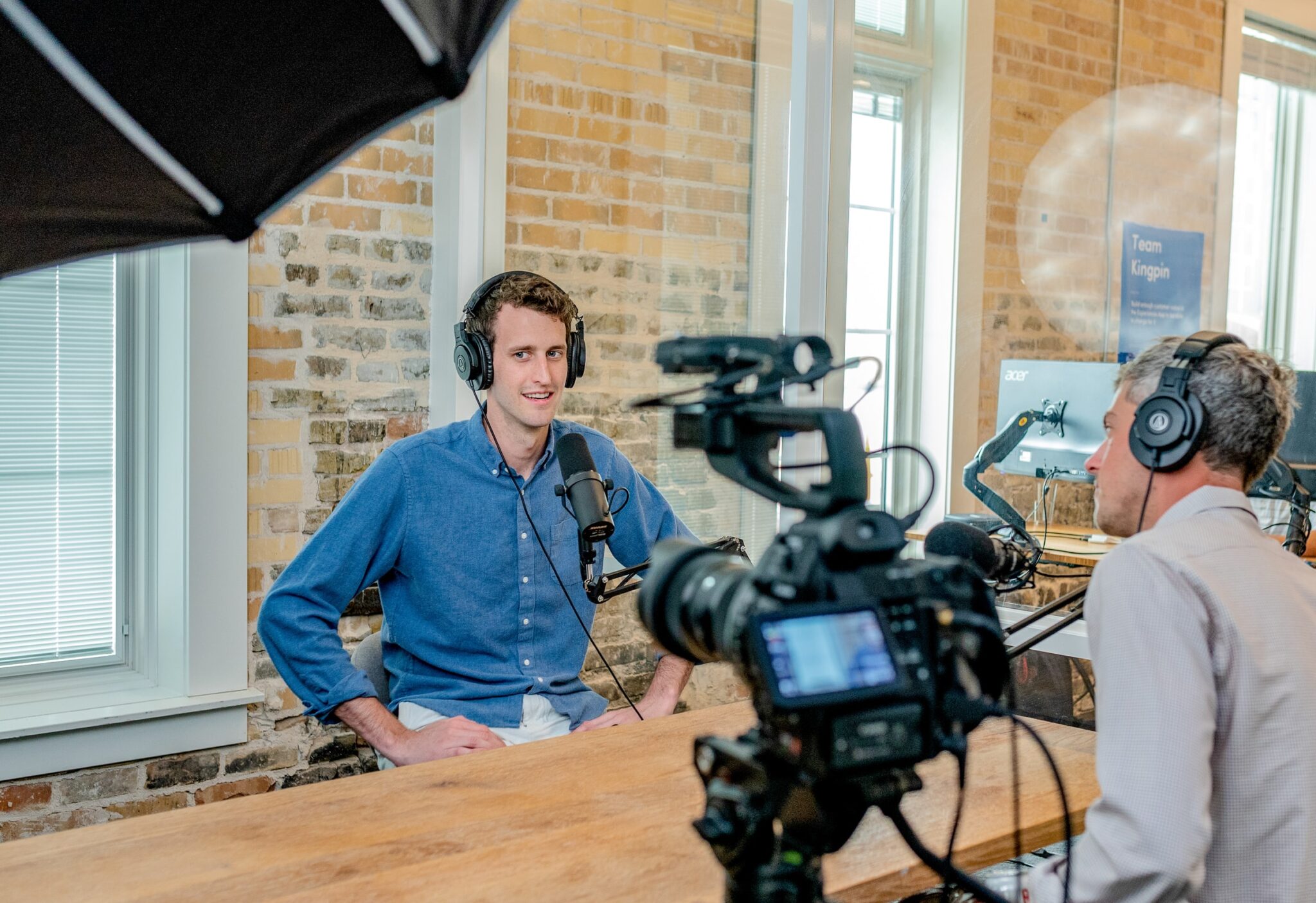 Man filming video content for an online course