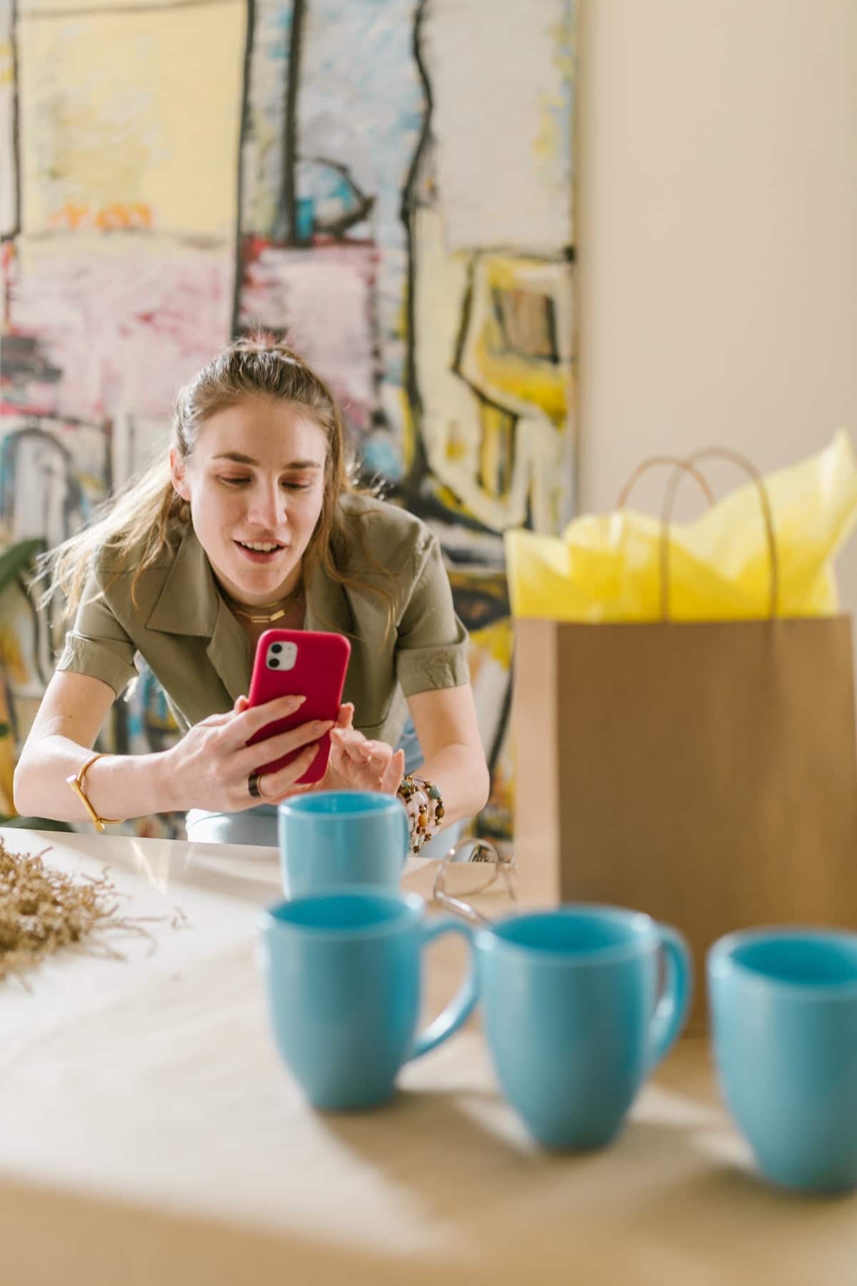 Woman looking at red phone