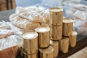 Canned food materials on a table.