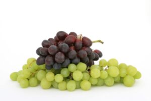 Picture of grapes against a white background.