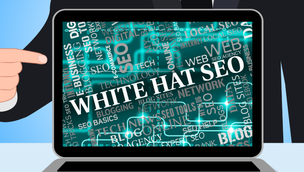 a laptop with the words white hat seo across the screen