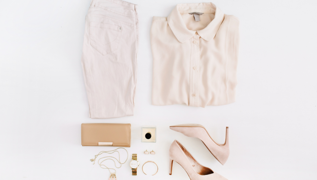 fashion blogging ideas - overhead shot of colour matched outfit separates folded and arranged on a white background
